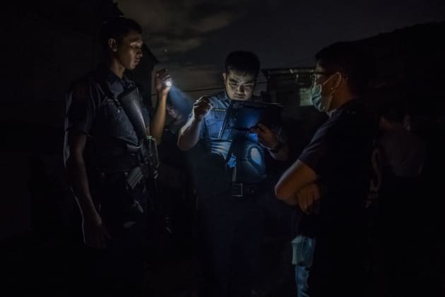 Police in Manila collate a report on a sting operation against Ronald Kalau, which left him dead. Police claim Kalau drew a 0.38-caliber handgun when he sensed something was wrong with the alleged purchase of methamphetamine, and the police gunned him down.