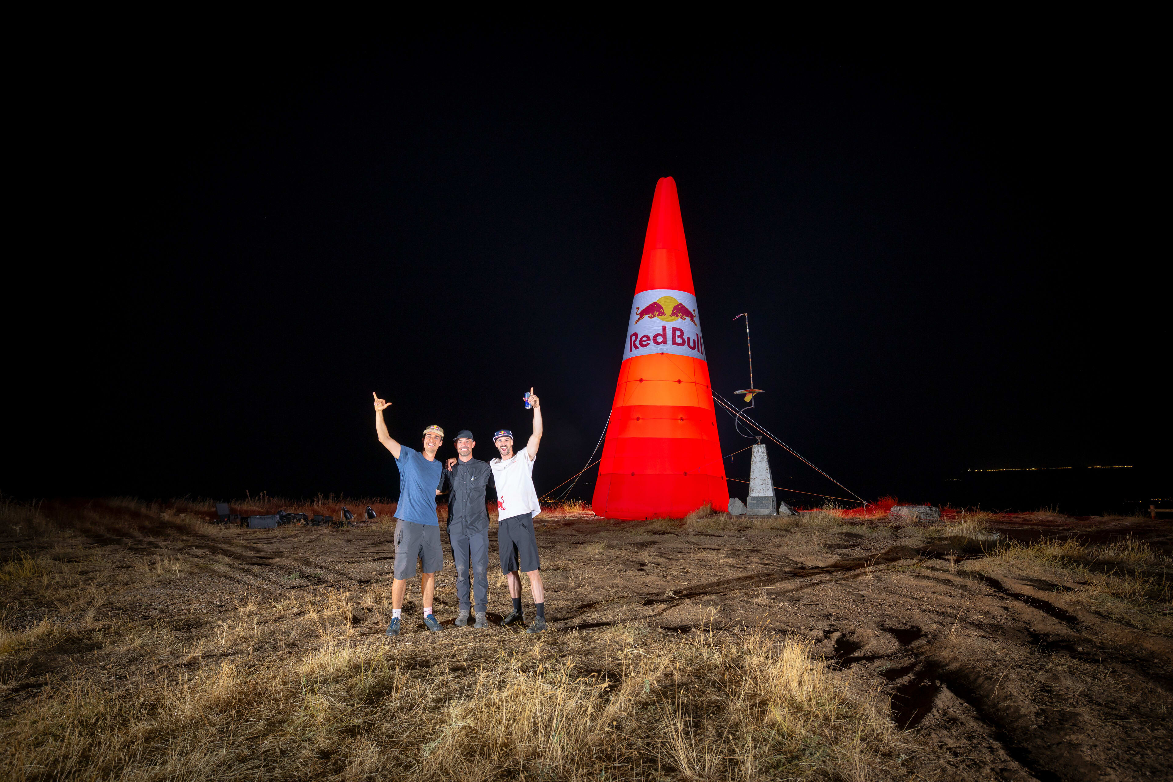 Mike Brewer and Dani Román with photographer Noah Wetzel celebrate wing-suiting past the total eclipse in Alarilla, Spain on August 12, 2026. // Noah Wetzel / Red Bull Content Pool