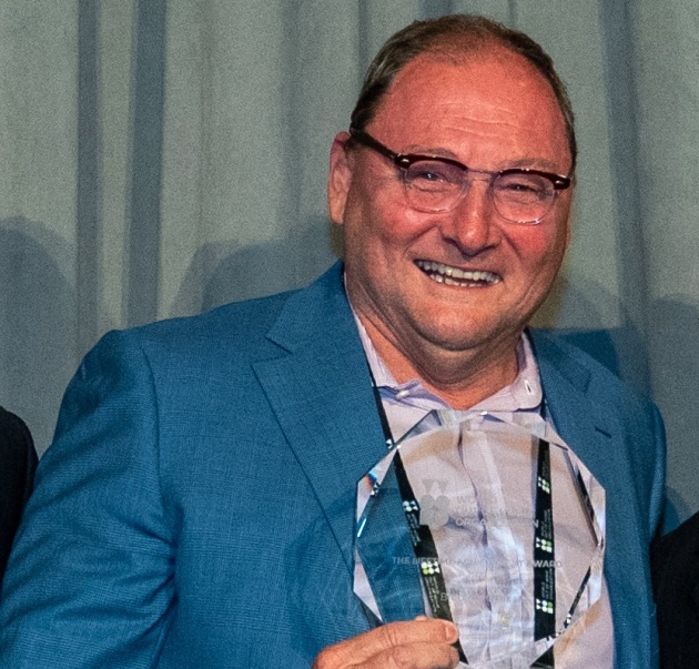Brendon Cook with his lifetime achievement June 2022