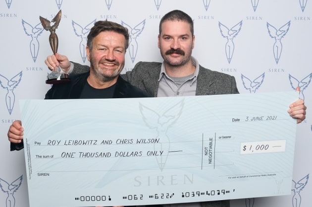 Chris Wilson from BMF Australia accepting the Siren Client Award prize from Lawrence Mooney