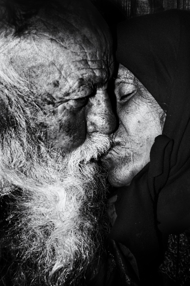 © Roland ‘Kilimanjaro’ Błazejewski, Family, Germany.
I met this couple in Berlin. They were sitting together on the side of a street when I started a conversation with them. We talked for a long time and the man repeated, ‘We are a family, we are together, we are strong’ over and over. When I got up to leave I glanced back at them and took this photograph.