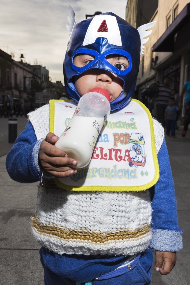 © Charlie Kwai, Captain America, Mexico. This Mexican boy dressed as Captain America walked unaccompanied down a street in Mexico City.
