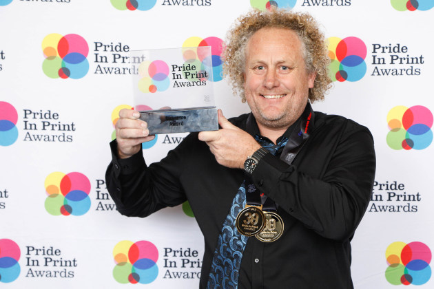 Simply overwhelming: Artrite managing director Glenn Taylor collects the Pride in Print award