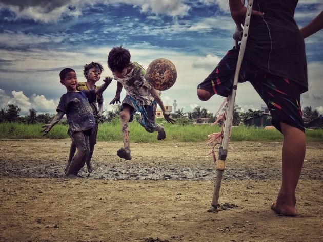 3rd Place, Photographer of the Year: I want to play by Zarni Myo Win, Myanmar
“A young boy who lost his leg was watching his friends play soccer, and he said he wanted to play soccer if he could.”
Location: Yangon, Myanmar. Shot on iPhone 7 Plus