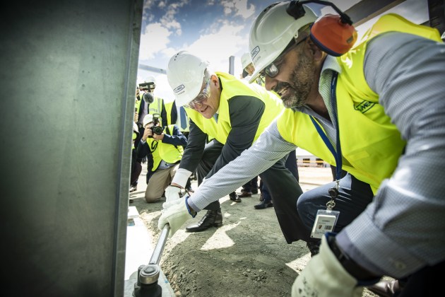 PM Scott Morrison tightening a bolt for the Assembly Hall. Civmec