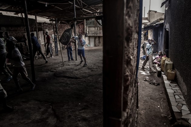 Boxer Moreen Ajambo (30) trains at the Rhino boxing club in Katanga, a large slum settlement in Kampala, Uganda, on 24 March. © John T. Pedersen