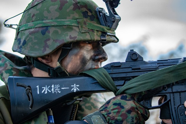 A service member with the Japan Self Defense Force holds security during a simulated reconnaissance mission of exercise Talisman Sabre 19. (Defence)