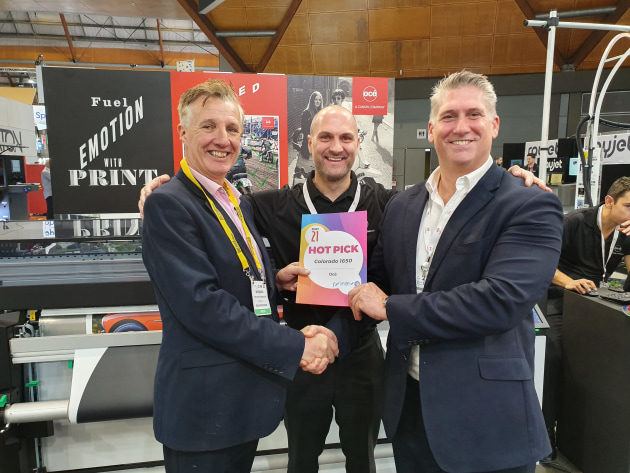 Hot Pick: Craig Nethercott (right) and Andy Cocker (centre) receive the award for the Colorado 1650 from Wayne Robinson at PrintEx