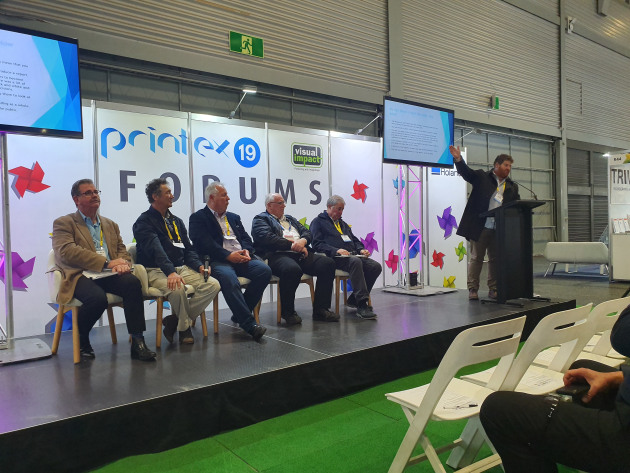 Hot topic: Mick Harrold (right) leads the panel on fire safety for signs at PrintEx.