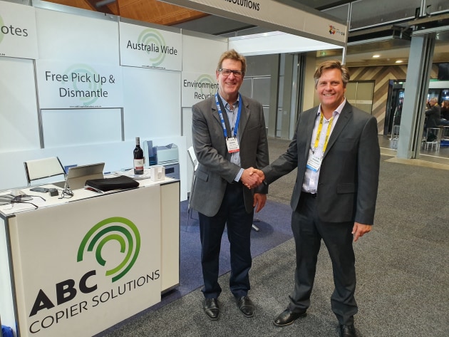 Done deal: Jaxon Crocker, ABC Copier Solutions (right) and Nigel Moss, Snap Mona Vale.