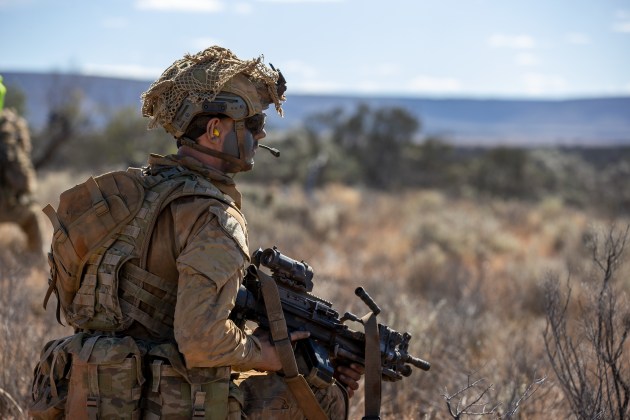 Private Benjamin Goodman from the 7th Battalion RAR, searches for enemy forces during a live-fire platoon attack serial part of Exercise Maroon Dawn 2021 at Cultana Training Area, SA. (Defence)