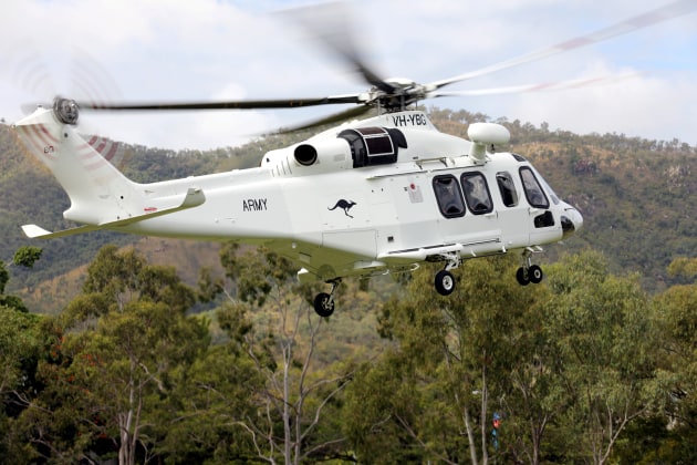 A Helicorp-leased Leonardo AW139 helicopter, operated by the Australian Army 5th Aviation Regiment, during Exercise Care Bear takes off from James Cook University oval in Townsville, Queensland. (Defence)