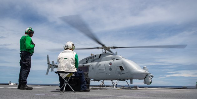 Aviation Electronics Technician 1st Class Corie Wooldridge, from San
Marcos, California, performs ground turns on an MQ-8C Fire Scout, attached to the Wildcards of Helicopter Sea Combat (HSC) Squadron 23, assigned to the Independence-variant littoral combat ship USS Jackson (LCS 6). (US Navy)