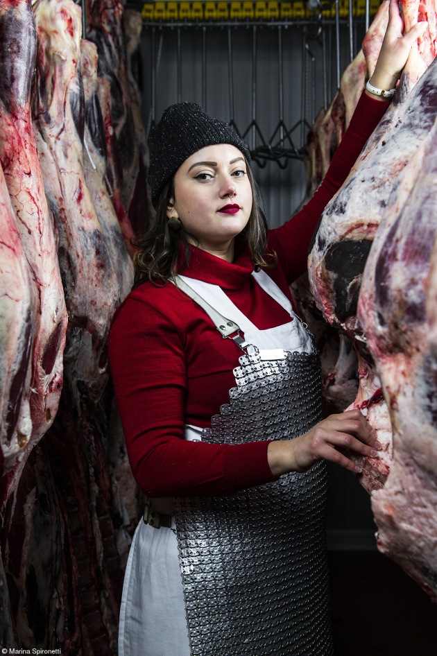 The Claire Aho Award for Women Photographers,	Marina Spironetti, Italy. 'Female butchers of Panzano - Martina'. Part of a project about the female butchers at Dario Cecchini's, the world’s famous butcher from Panzano in Chianti. For some time now, Dario has been training a team of young ladies, who came to Tuscany from all over the world to learn the art of deboning. Traditionally, women butchers have always existed in Tuscany.