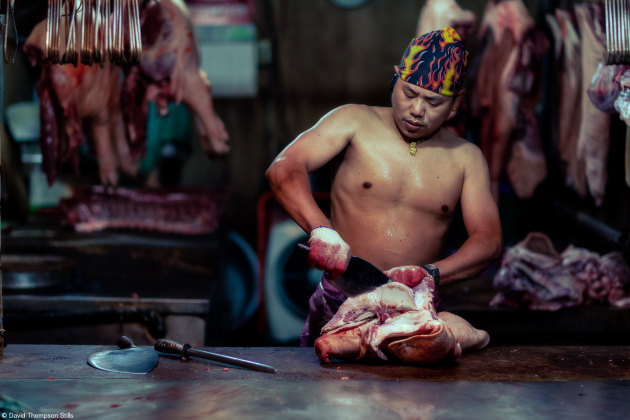 The Philip Harben Award for Food in Action, David Thompson	Taiwan. 'Head to Head'. Taken at Wanhua District night market, Taipei, Taiwan the photo depicts a butcher preparing cuts for the daily traditional market, here seen working on a pigs head cutting out the cheeks.