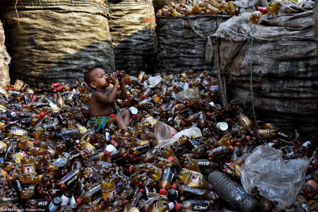 World Food Programme Food for Life, Md Mahabub Hossain Khan,	Bangladesh. 'Drinking from garbage'. A little child drinking from a bottle.