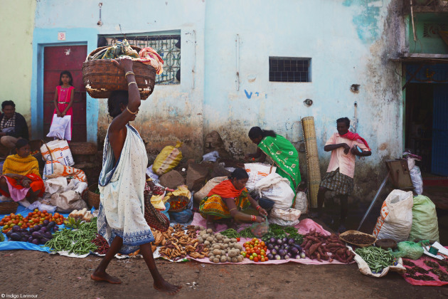 Young - 11 - 14, Indigo Larmour, India. 'Odisha Tribal Markets'. The tribal markets in Odisha are some of the most colourful in all of India. Vendors commonly sit on the ground and spread-out vegetables that they are selling.