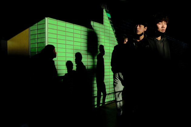 Pedestrians captured in the pockets of sunlight pop against the shadows when exposing for the highlights. This technique is effective when shooting in cluttered or busy locations and can help pull focus to specific elements of a scene. Fujifilm X-T2, Fujifilm 23mm f/2 lens. 1/200s @ f11, ISO 250.