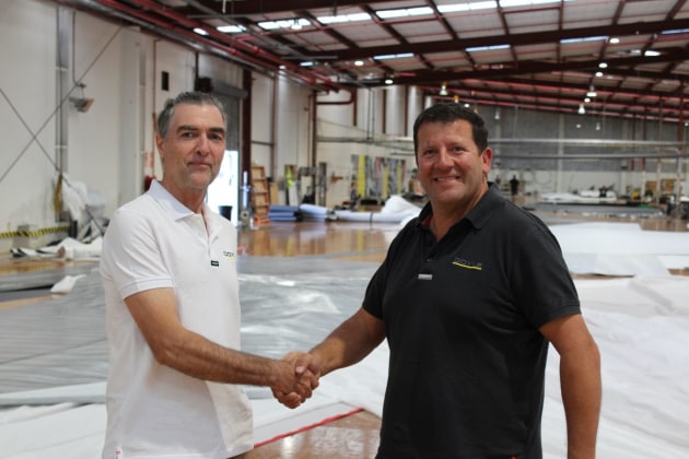 Andrew Lechte (left) is welcomed by Doyle Sails managing director David Duff at the Doyle Sails New Zealand loft.