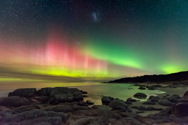 Aurora Australis from Beerbarrel Beach © James Stone (Australia). Nikon D750 camera, 15 mm f/3.2 lens, ISO 6400, 10-second exposure.