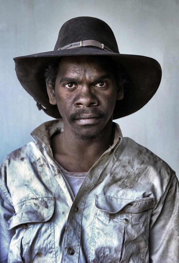 From the ‘Aak Puul Ngantam Stockman’ series, ‘Dominic Ngakyunkwokka - Stockman’. Dominic Ngakyunkwokka is a young Indigenous stockman learning the ropes of the trade mustering on Cape York Peninsula. I made portraits of all the participants of the Aak Puul Ngantam mustering group, Indigenous and white, elderly and very young, as they returned from a gruelling day bringing in the wild cattle. This image was a prize winner at the Head On Portrait Prize 2013. Nikon D3S, Nikkor 28-300mm lens at 98mm, 1/50s @ F5.6, ISO 400.