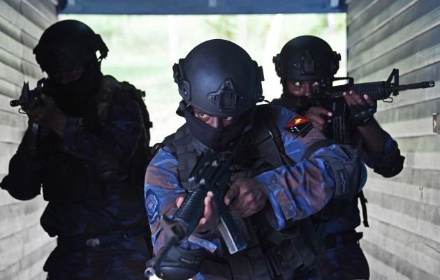 Papua New Guinea Special Forces police train in urban containment prior to the arrival of world leaders for the APEC conference in Port Moresby in November 2018. Made for syndication by the News Ltd group. Nikon D5, Nikkor 28-300mm lens @ 98mm, 1/400s @ F5.6, ISO 1600.