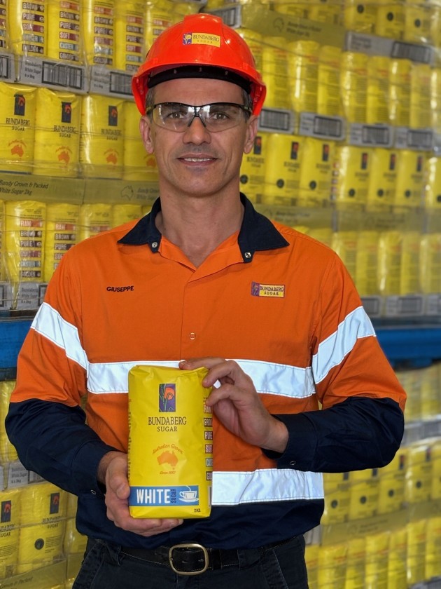 Giuseppe Barazza, GM Operations and Sustainability, Bundaberg Sugar, shows off the paper sugar bag.