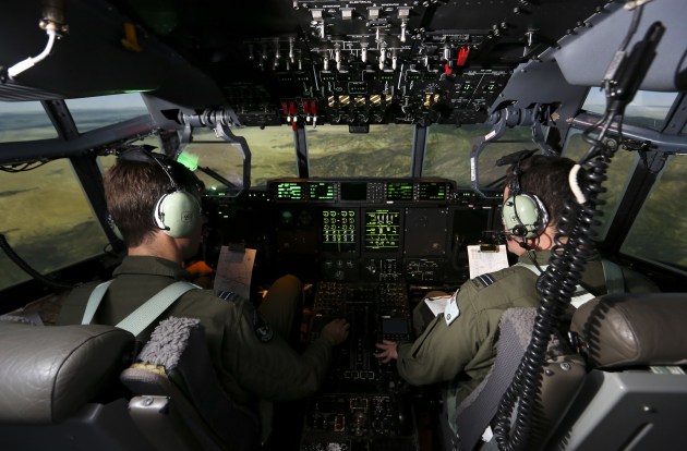 RAAF pilots fly a mission in the C-130J Full-Flight Mission Simulator during a Coalition Virtual Flag Exercise. (Defence)