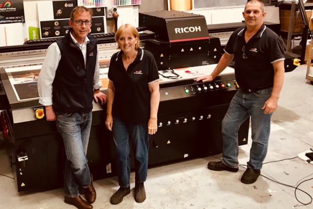 New Ricoh flatbed at D&D Digital: (l-r) Brian Duncan, Sue Carter, and Brendan Ilsley