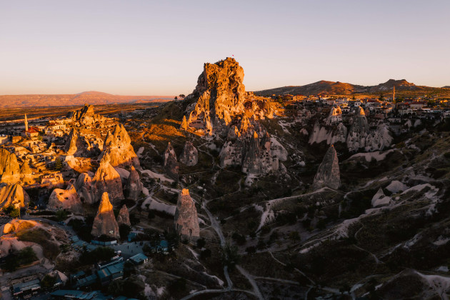 Uchisar Castle, Cappadocia, Turkey. The pointy shape of the numerous Fairy Chimneys around Cappadocia required afternoon side lighting to create contrast and depth within the scene. I waited until the light was low enough to hit the tips of the chimneys to draw the viewers eyes across the frame. DJI Mavic 2 Pro. 1/320s @ f4, ISO 100. -O.7EV. 