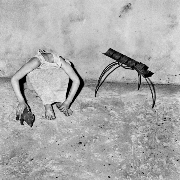 © Roger Ballen. Head Inside Shirt, 2001.