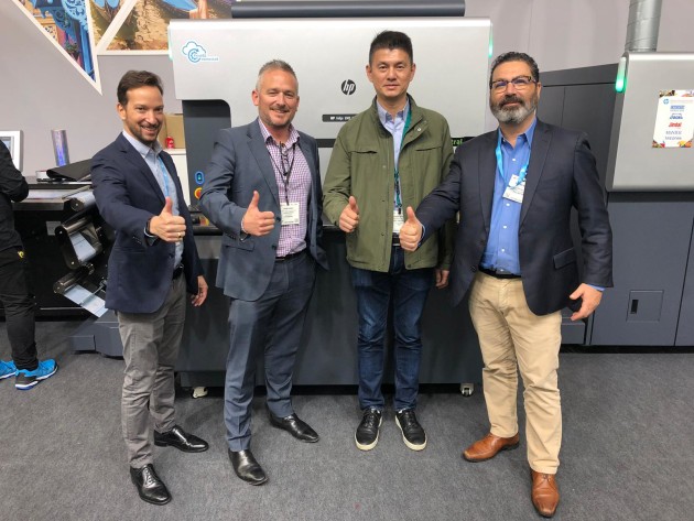 Next into labels: Romeo Sanuri (2nd right) at Labelexpo with (l-r) Yoav Lotan, HP; Mark Daws, Currie Group; and Rafael Kraus, HP