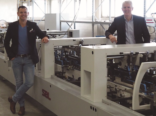 New opportunities for customers: Mark Randles (right) with Darren Sibbison, Immij partner, and the new folder gluer