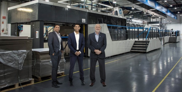 First C500 in Australia: Pictured with the new press are (l-r) Paras Italiya, general manager, Italiya Graphics; Vimal Italiya, managing director, Italiya Graphics; and Bruce Caldwell, sales consultant, HP PageWide Industrial