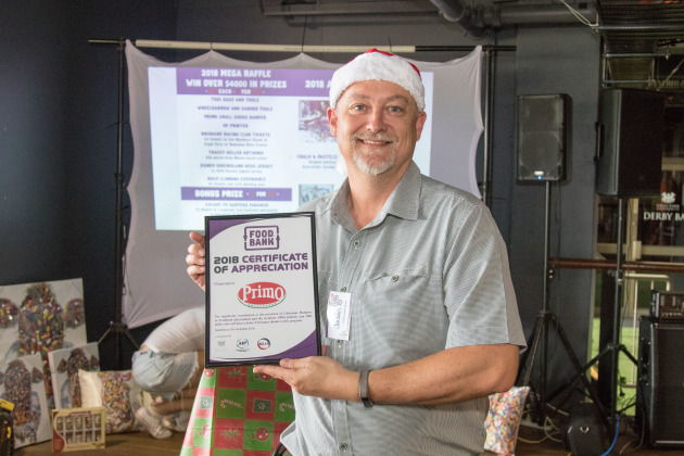 No stranger to the concept of 'giving back': Jason Fields at the 2019 AIP Foodbank Christmas hamper packing event.