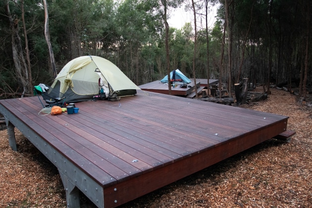 New tent platforms at Hegartys Campground framed by forest. Caro Ryan