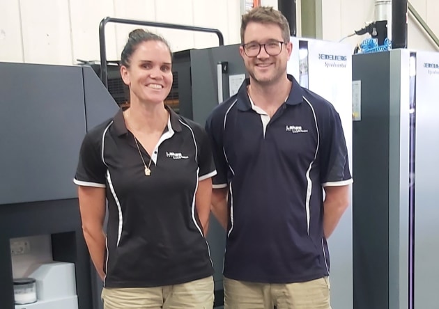 Family values: Brooke Levins and Aidan Vaughan at Lakes Printers with the new Heidelberg CX-75