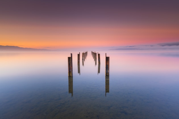 © Laurie Winter. Vanishing Point. "The remains of an old, broken jetty on Lake Wairarapa, New Zealand."