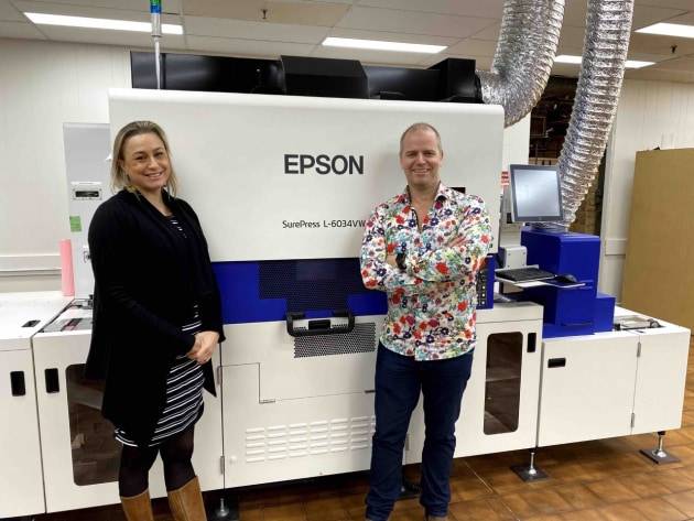 Taking Action digital: James and Debbie Malone with the new Epson SurePress