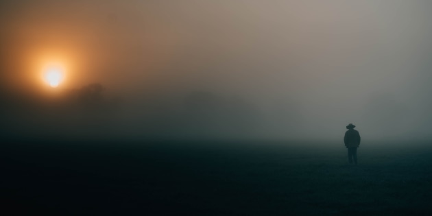 © Matt Beaver. Grand Prize winner. The Fog. A farmer checks the paddocks in the early morning fog.