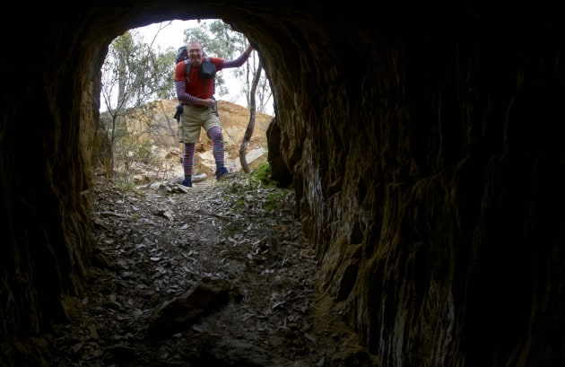 Stone frames a bush view from a gold tunnel at Manchester Reef mine site. M Ball