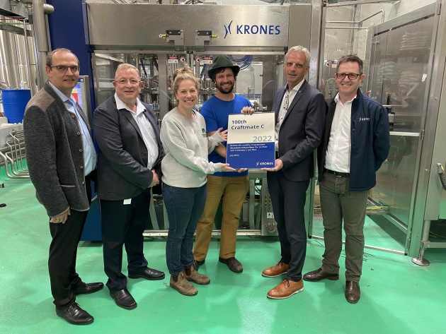 Marking the 100th Craftmate C installation with a special plaque, L-R: Krones Pacific head of sales Franz Kirchberger; Krones Pacific MD Richard Gahagan; Mountain Culture's Harriet McCready and DJ McCready; Krones head of sales, Thomas Gerstl; Krones Pacific sales manager Grant Day. Image: Food & Drink Business.