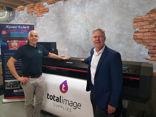 Ideal partner: Tyson Buechler, general manager of Total Image Supplies (left) with Russell Cavenagh, general manager of Mutoh Australia, pictured with the new XpertJet at Total Image Supplies.