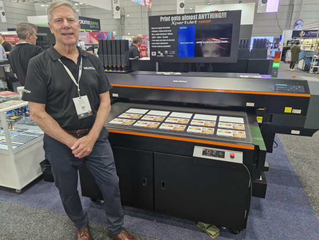 Market growing exponentially: Russell Cavenagh with the new Mutoh XpertJet 1462 direct-to-object printer at Visual Impact