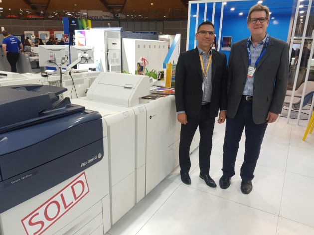 Double up: Snap Warriewood to install second Fuji Xerox 180, pictured are owner Nigel Moss (right) with Harry Singh from Fuji Xerox