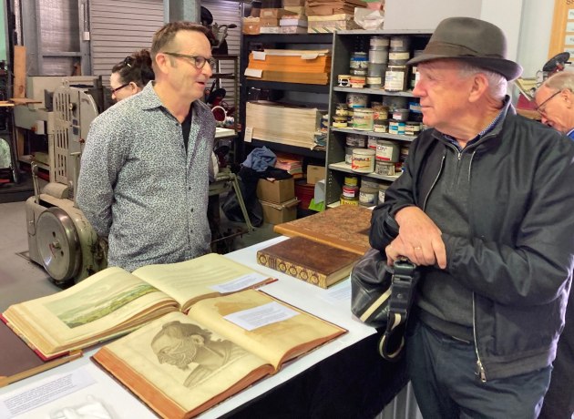 Bonding over old and rare books at Penrith Museum: Stephen Hannan (left) and Patrick Howard.