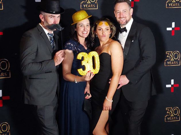 Party time: Philip Trumble (right) and Andrea Georgiadis (2nd right) host the Pozitive 30th birthday