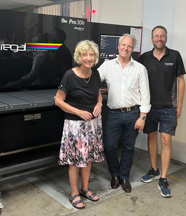 Boosting sign and display: Walter Kuhn (centre) acquires Rega Signs & Design