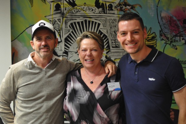 Learning labels at Holmesglen: Owners of Revolution Print, Ballarat and big Konica Minolta fans, John Schreenan (left) and Leon Wilson share notes with Sue Threlfo on the progress of their KM-1.