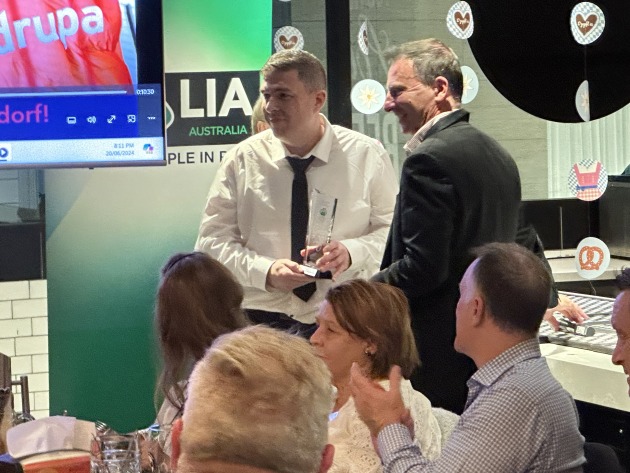 Graduate of the Year: Robert Neale from Westrock receives the award from Heidelberg managing director Savas Mystakidis